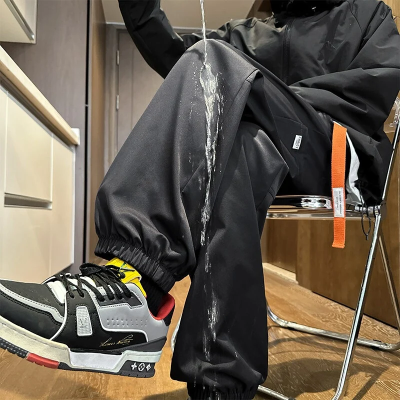 Herren Wasserabweisende Tech-Jogginghose mit elastischem Saum, Kordelzug und robusten Nähten Nord Taschen