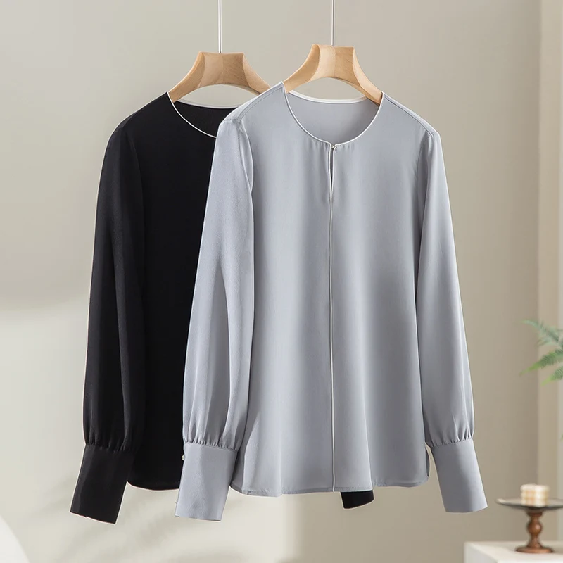 Damen Elegante seidenähnliche Bluse mit Kontrastpaspel und verlängerten Manschetten Nord Taschen