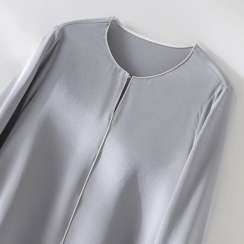 Damen Elegante seidenähnliche Bluse mit Kontrastpaspel und verlängerten Manschetten Nord Taschen