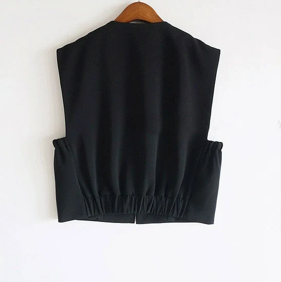 Damen Modische ärmellose Weste mit Knopfdetails Nord Taschen