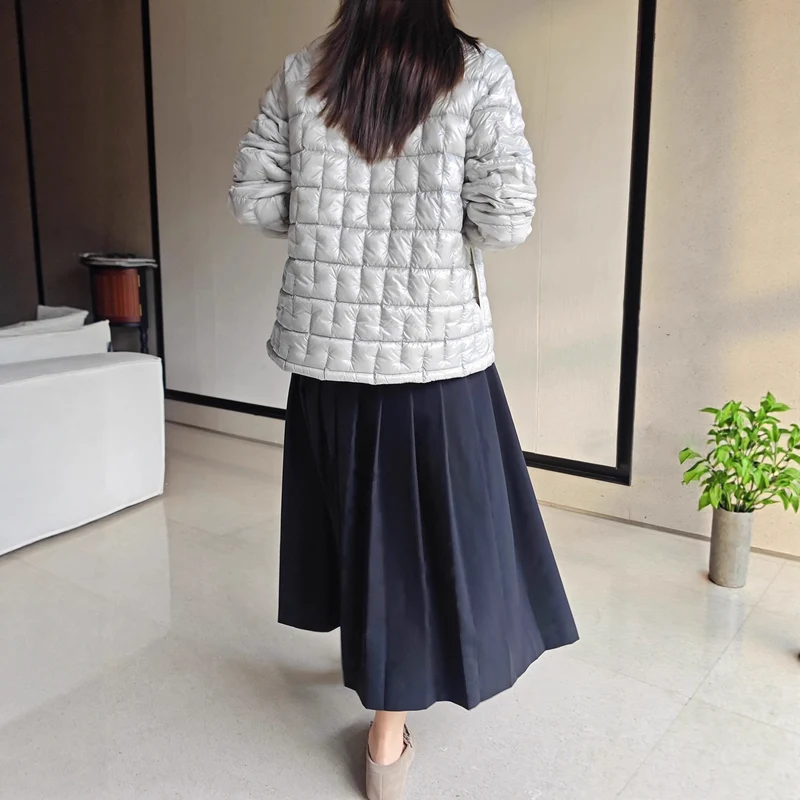 Damen Modische Steppjacke mit glänzender Oberfläche Nord Taschen