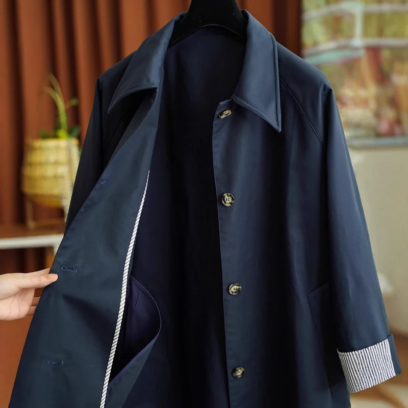 Damen Eleganter Trenchcoat mit Kontrastdetails Nord Taschen