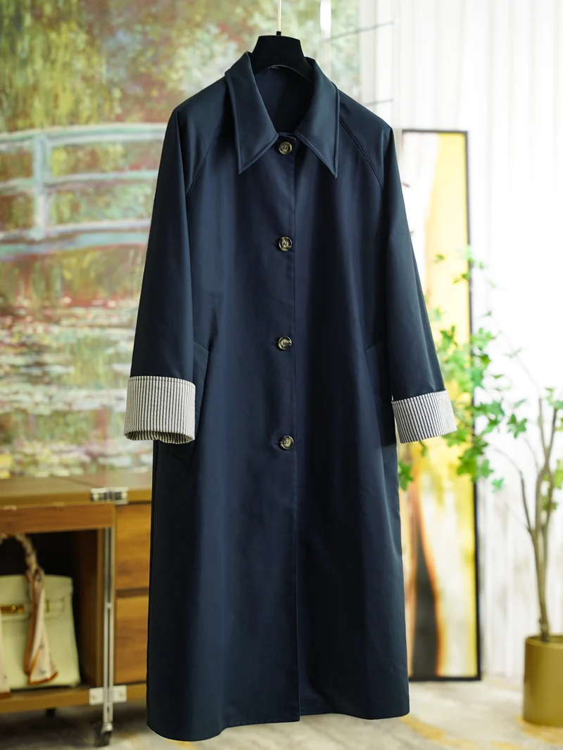Damen Eleganter Trenchcoat mit Kontrastdetails Nord Taschen