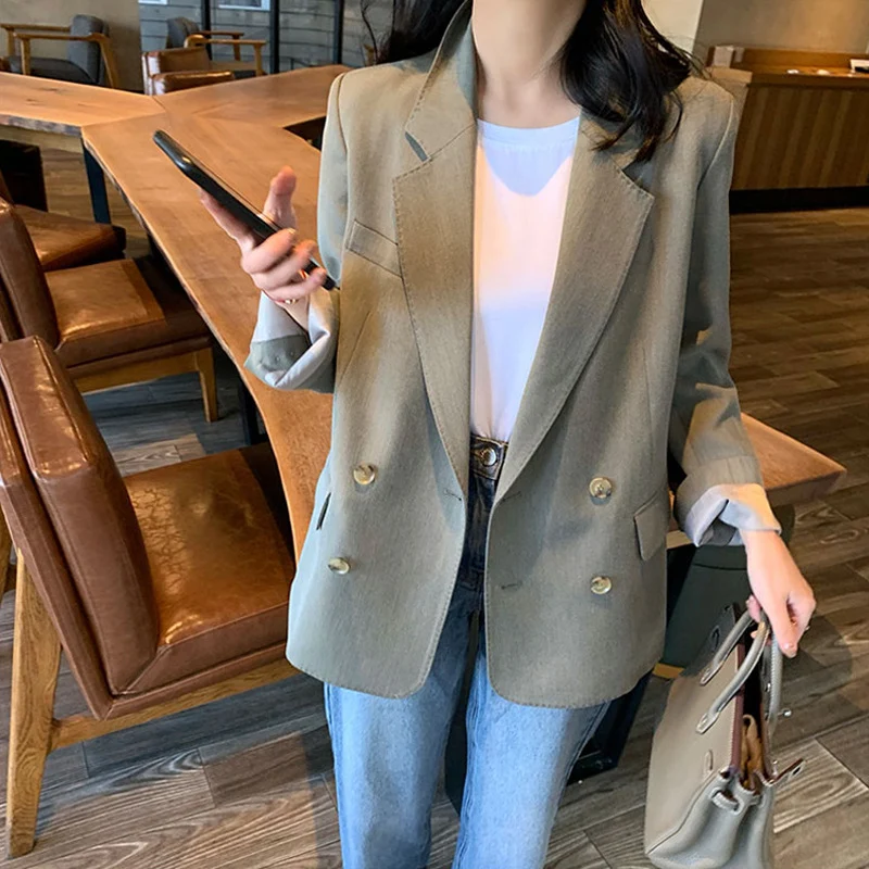 Damen Eleganter, taillierter Prägeblazer Nord Taschen