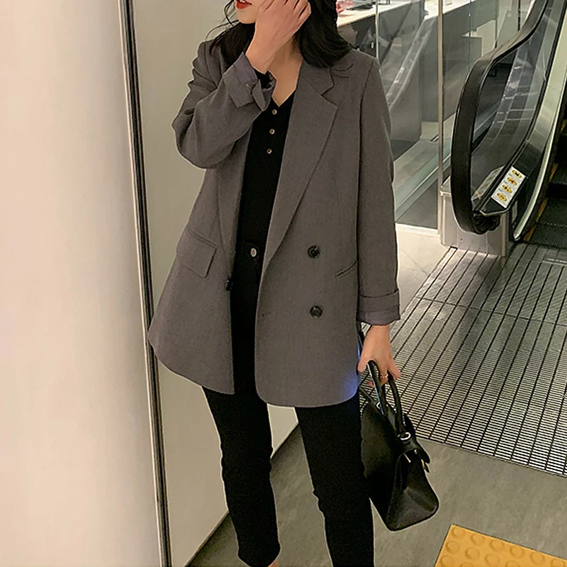 Damen Eleganter, taillierter Prägeblazer Nord Taschen