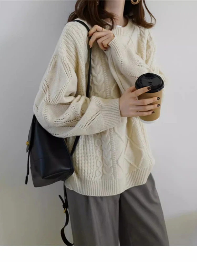 Damen Oversize Zopfmuster-Strickpullover mit Ajour‑Details und geripptem Saum Nord Taschen