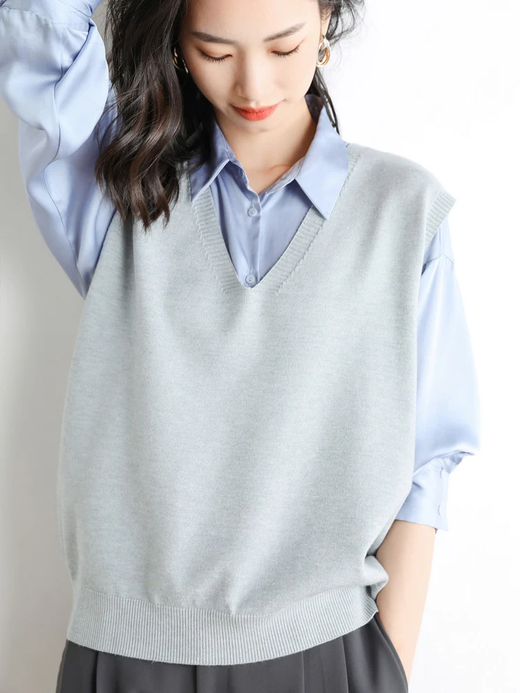 Damen Oversize V-Ausschnitt Feinstrickweste mit Rippenbund Nord Taschen