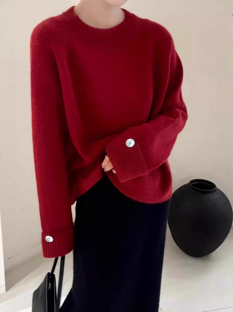 Damen Oversize-Rundhalspullover mit verlängerten Manschetten und Zierknopf Nord Taschen