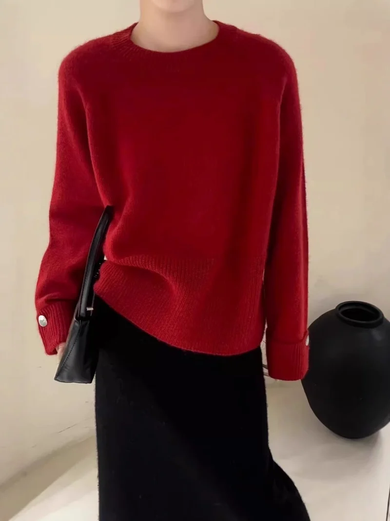 Damen Oversize-Rundhalspullover mit verlängerten Manschetten und Zierknopf Nord Taschen
