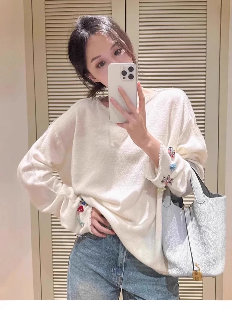 Damen Oversize-Feinstrickpullover mit schmuckbesetzten Ärmelabschlüssen Nord Taschen
