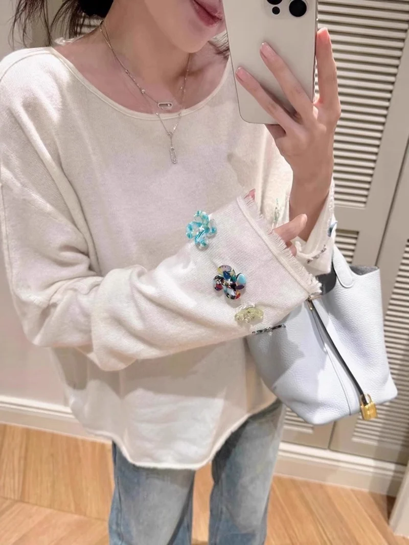 Damen Oversize-Feinstrickpullover mit schmuckbesetzten Ärmelabschlüssen Nord Taschen