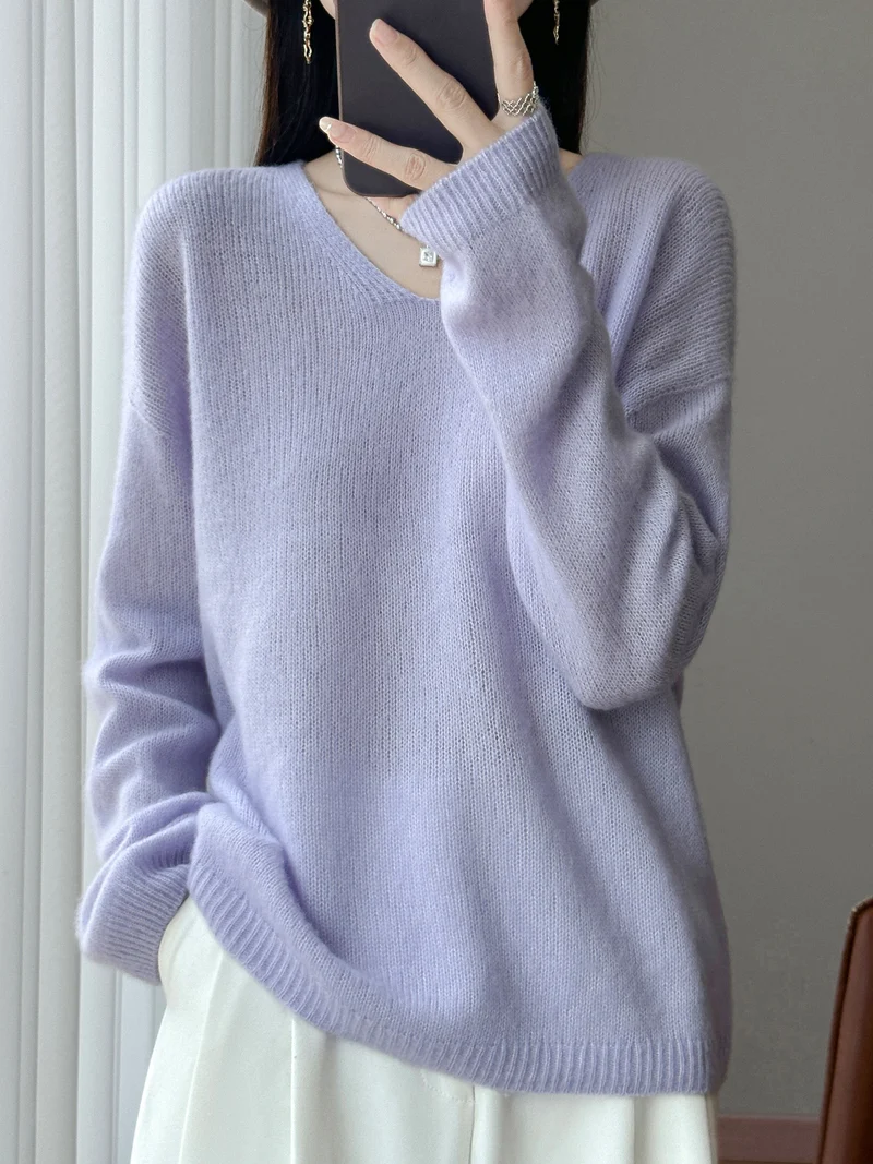 Damen Oversize-Feinstrickpullover mit feinem V-Ausschnitt und verlängertem Ärmelabschlusst Nord Taschen