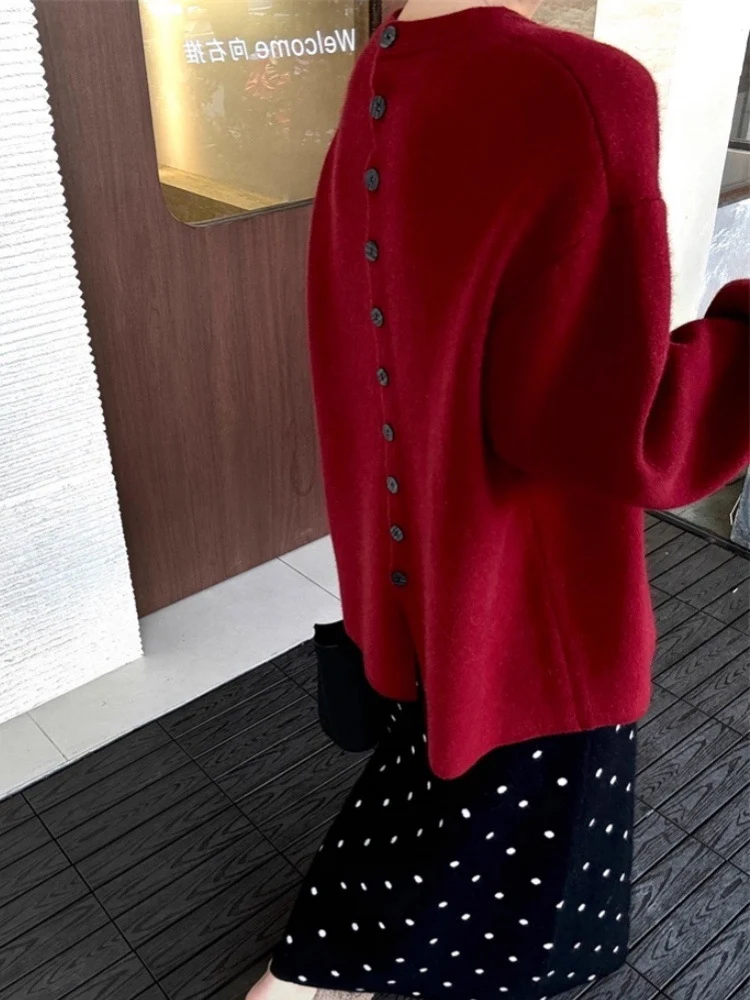 Damen Oversize-Feinstrickpullover mit Ballonärmeln und Knopfmanschette Nord Taschen