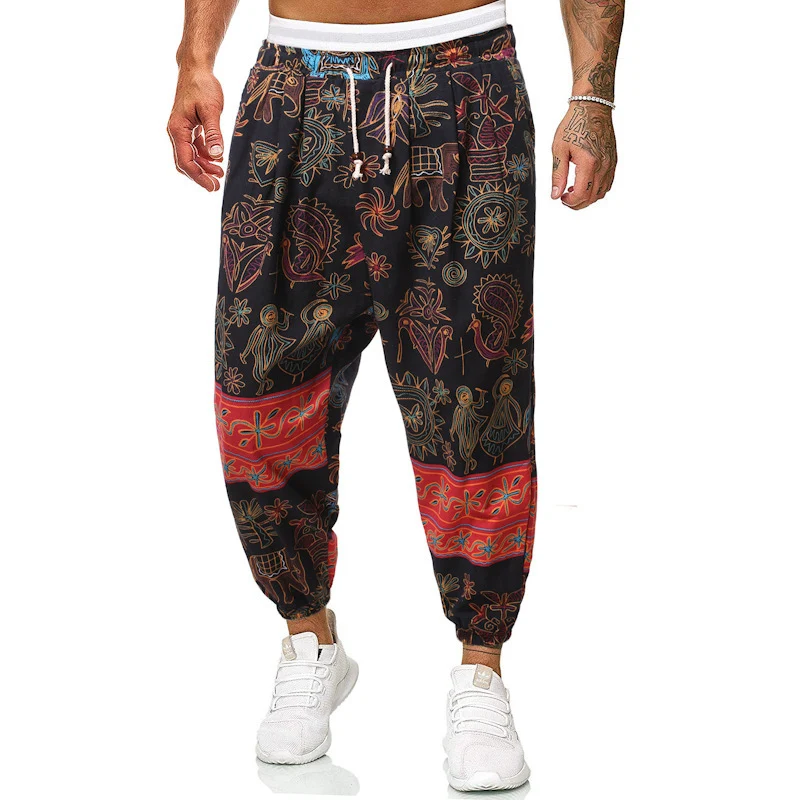 Herren Locker sitzende Patchwork-Loungehose mit Tunnelzug, elastischen Knöcheln und dekorativem Allover-Print Nord Taschen
