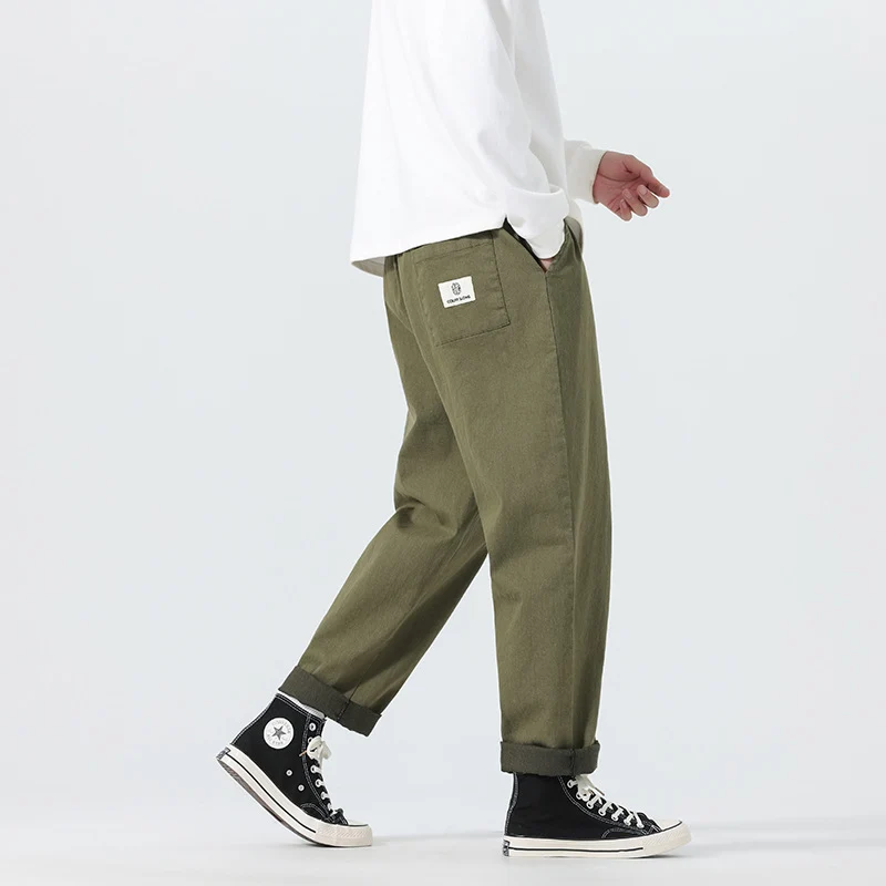 Herren Locker geschnittene Cropped-Denimhose mit Umschlag und Label-Patch Nord Taschen