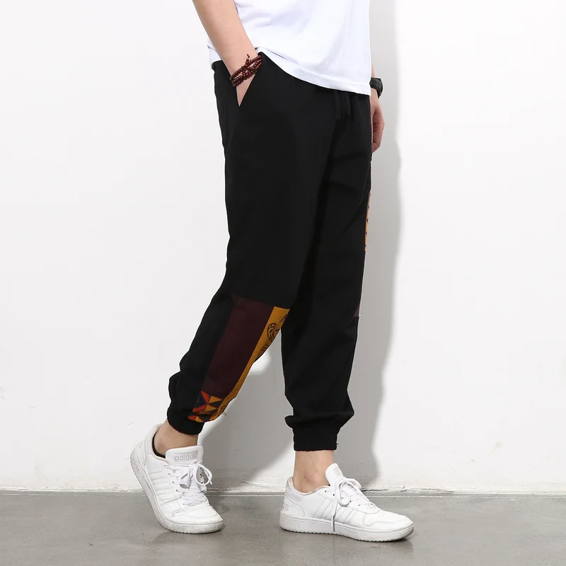 Herren Jogginghose mit seitlichen Panel-Prints, Tunnelzug und gerippten Bündchen Nord Taschen