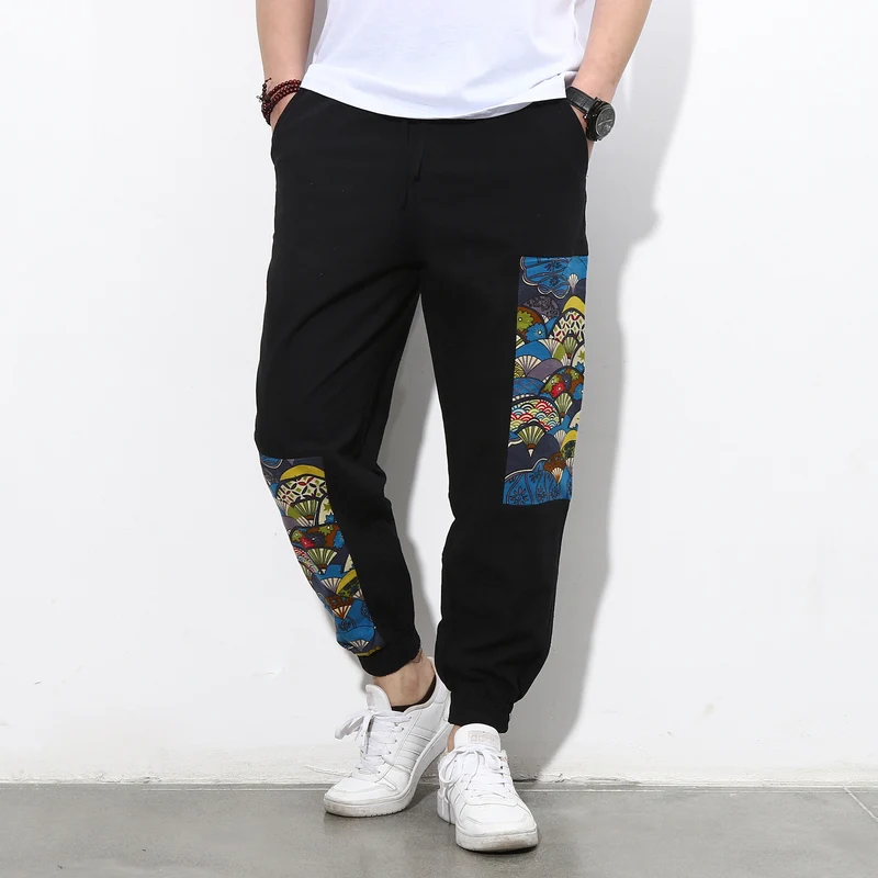 Herren Jogginghose mit seitlichen Panel-Prints, Tunnelzug und gerippten Bündchen Nord Taschen