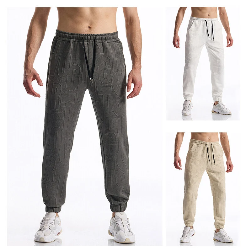 Herren Jogginghose mit elastischem Bund, Tunnelzug und geprägtem Allover‑Logo‑Relief Nord Taschen