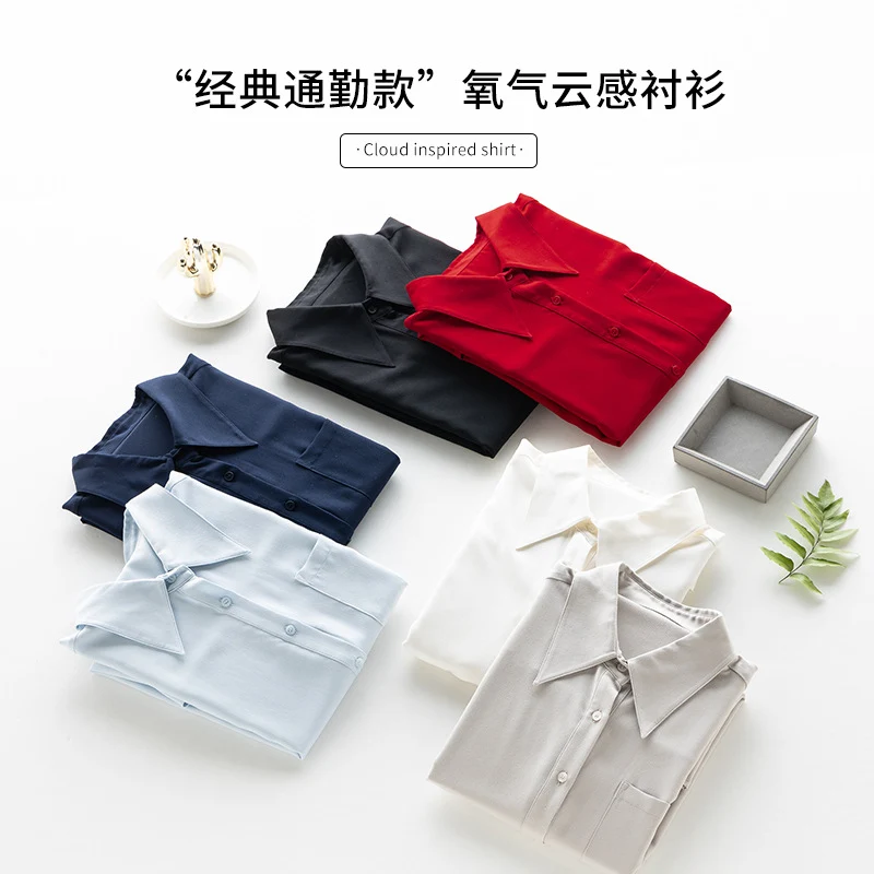 Damen seidenähnliche Oversize-Bluse mit spitzem Hemdkragen und Brusttasche Nord Taschen