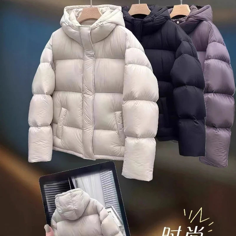 Damen Kurz geschnittene wattierte Kapuzenjacke mit Blocksteppung und Windschutzblende Nord Taschen