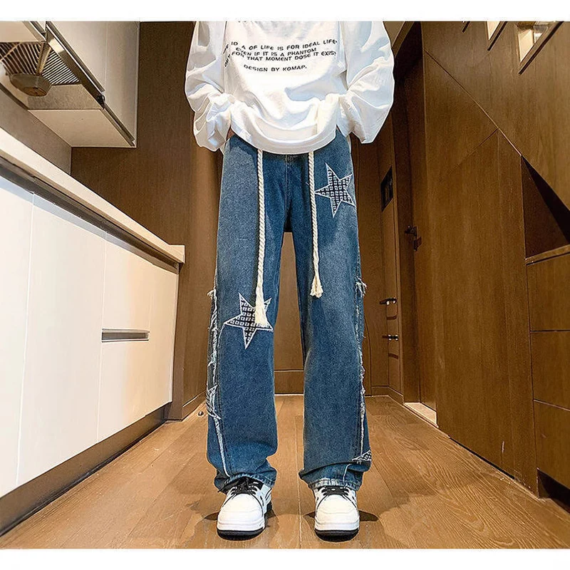 Damen Weite High‑Waist Denimhose mit Stern‑Applikationen, Fransen‑Seitenschlitzen und Kordelbund Nord Taschen