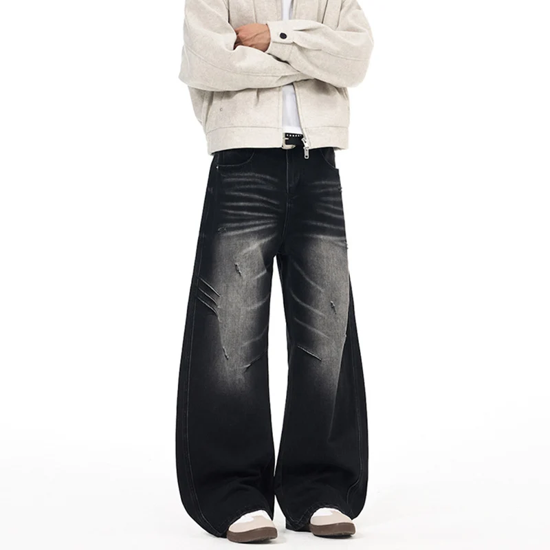 Herren Ultraweite Denim-Palazzohose mit skulpturalen Seitenbahnen und Used‑Effekt Nord Taschen