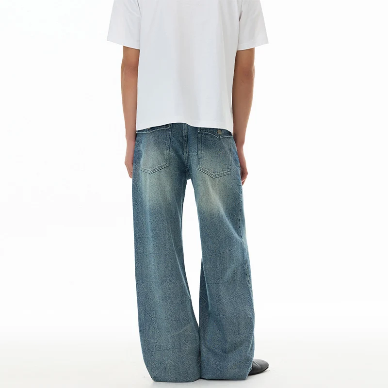 Herren Ultraweit geschnittene Denim-Baggy-Jeans mit markanten Whisker-Akzenten und bodenlangem Saum Nord Taschen