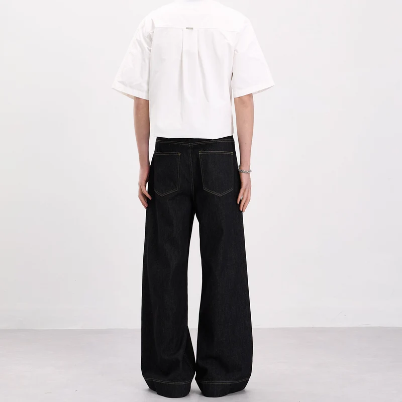 Herren Oversize-Denim-Palazzohose mit skulpturalen Paneelnähten und tiefem Schritt Nord Taschen