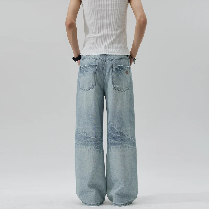 Damen Extraweite Stonewashed Denim-Palazzohose mit tiefem Schritt und geradem Saum Nord Taschen