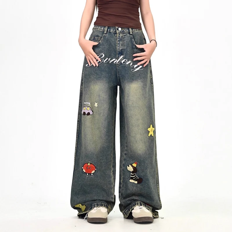 Damen Weitgeschnittene Kostümjeans mit buntem Stickdesign Nord Taschen