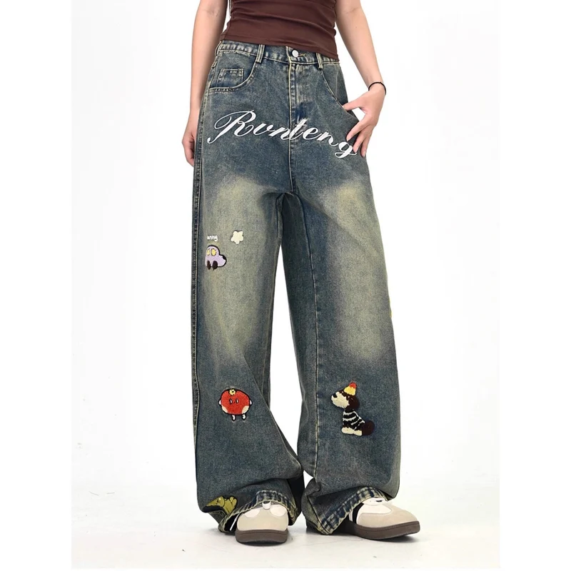 Damen Weitgeschnittene Kostümjeans mit buntem Stickdesign Nord Taschen