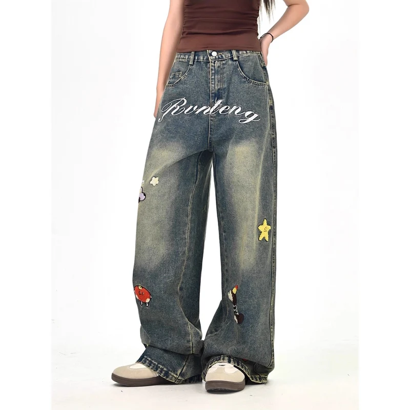 Damen Weitgeschnittene Kostümjeans mit buntem Stickdesign Nord Taschen