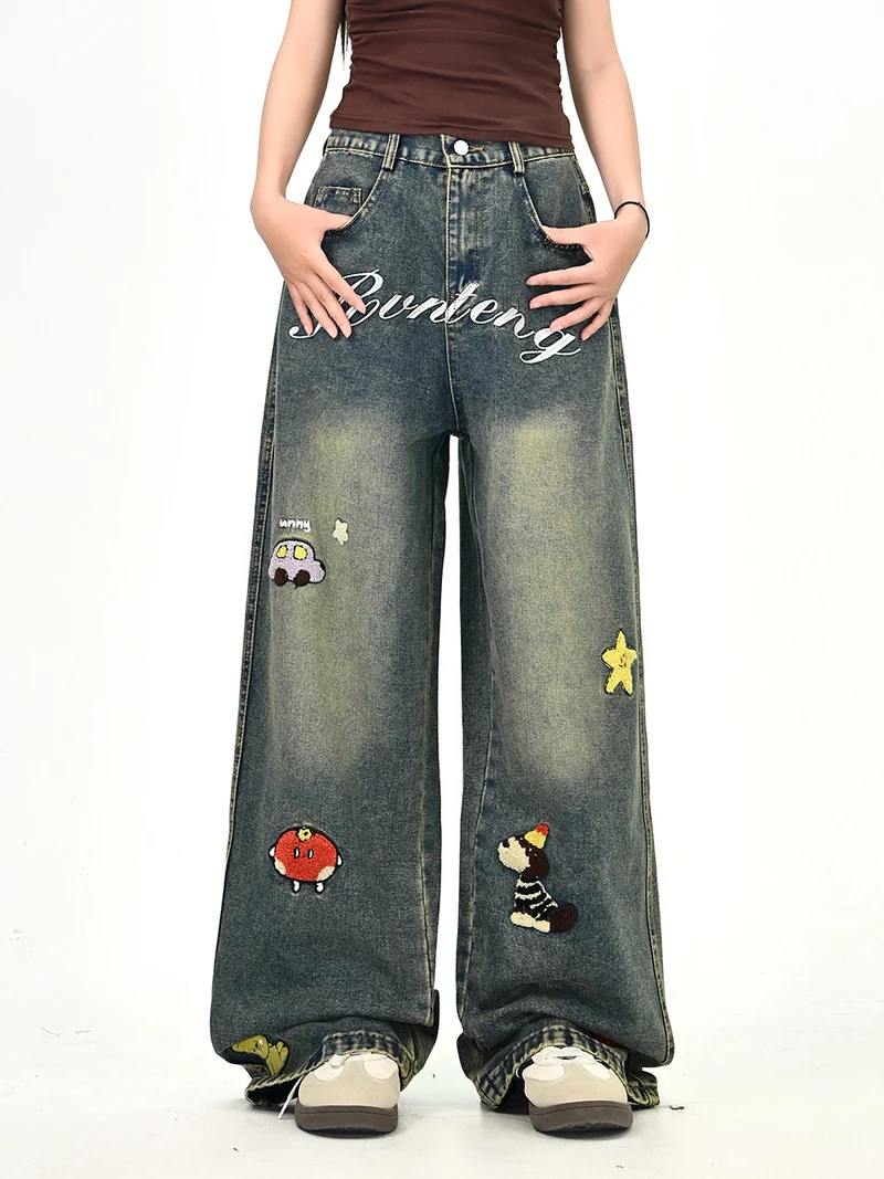 Damen Weitgeschnittene Kostümjeans mit buntem Stickdesign Nord Taschen