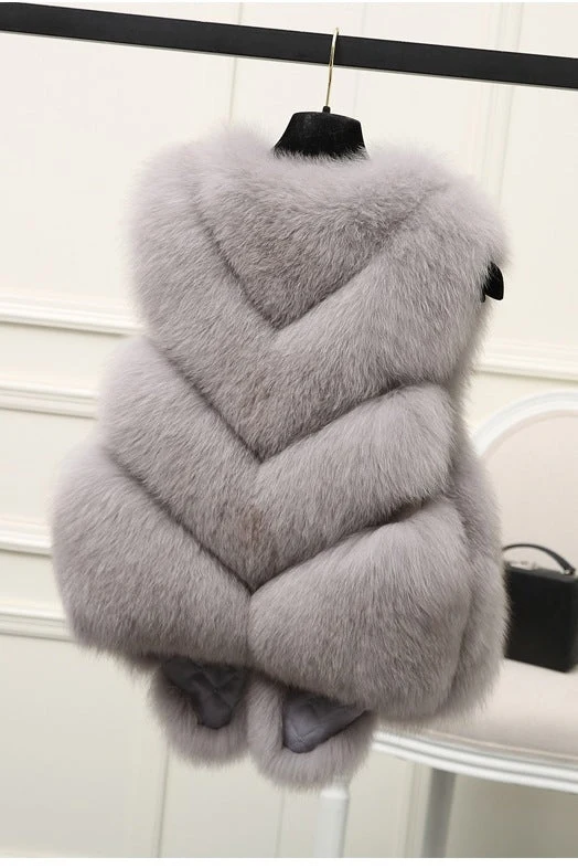 Damen Luxus Kunstfell Weste mit voluminösen Details