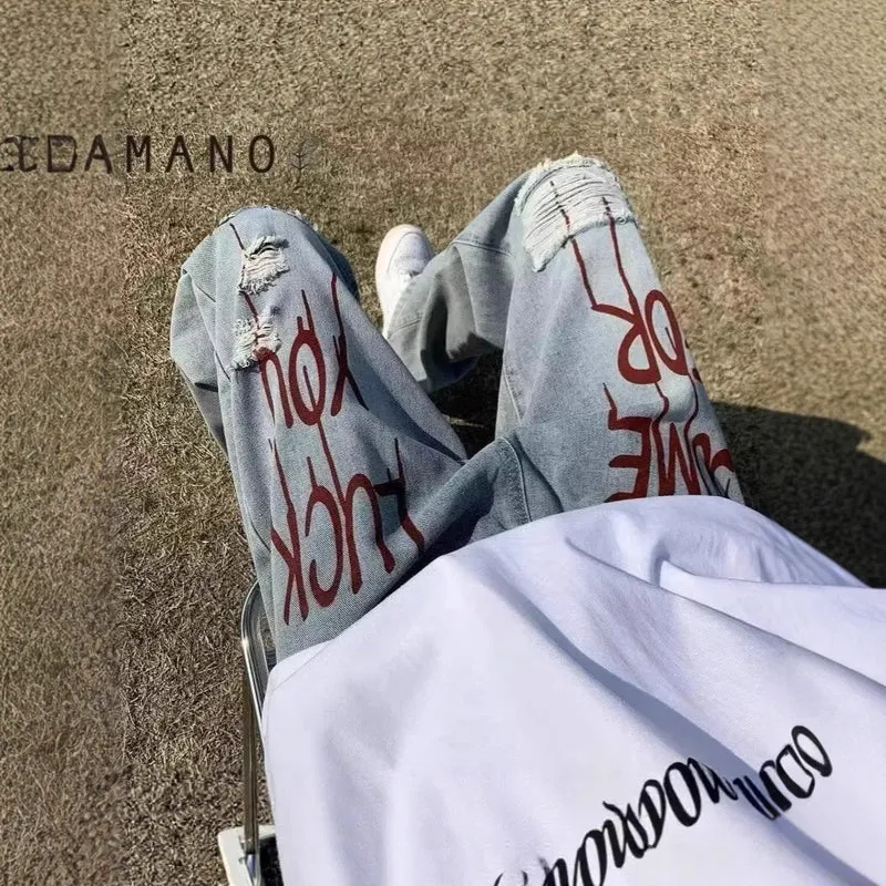 Damen Modische Destroyed Denim-Jeans mit farbenfrohem Aufdruck Nord Taschen
