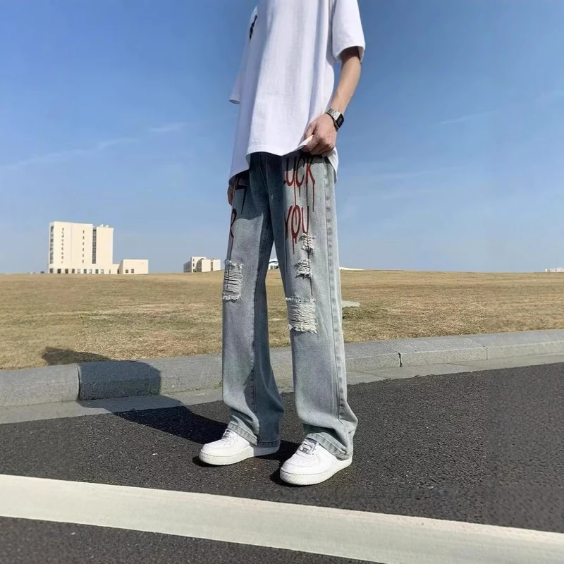Damen Modische Destroyed Denim-Jeans mit farbenfrohem Aufdruck Nord Taschen