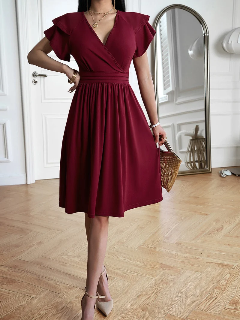 Damen Wickelkleid mit voluminösen Ärmeln und femininem V-Ausschnitt