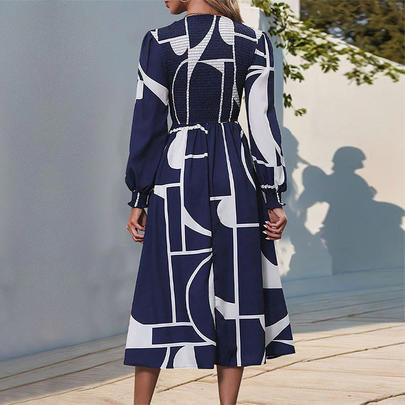 Damen A‑Linien‑Midikleid mit Smock‑Bustier, langen Ballonärmeln und grafischem Print Nord Taschen